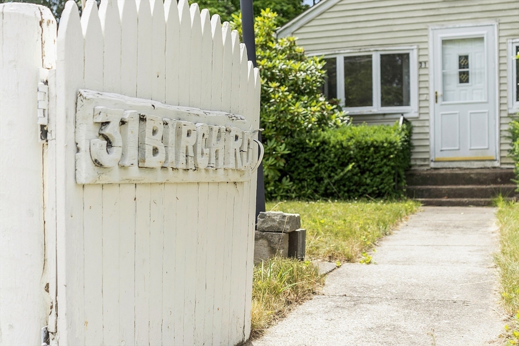 31 Birch Road Westford, MA 01886 - Photo 3 of 42 a view of a pathway of a house with potted plants