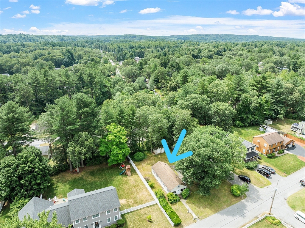 31 Birch Road Westford, MA 01886 - Photo 31 of 42 an aerial view of a house with a yard