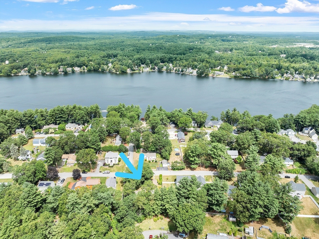 31 Birch Road Westford, MA 01886 - Photo 35 of 42 an aerial view of a houses with a lake view
