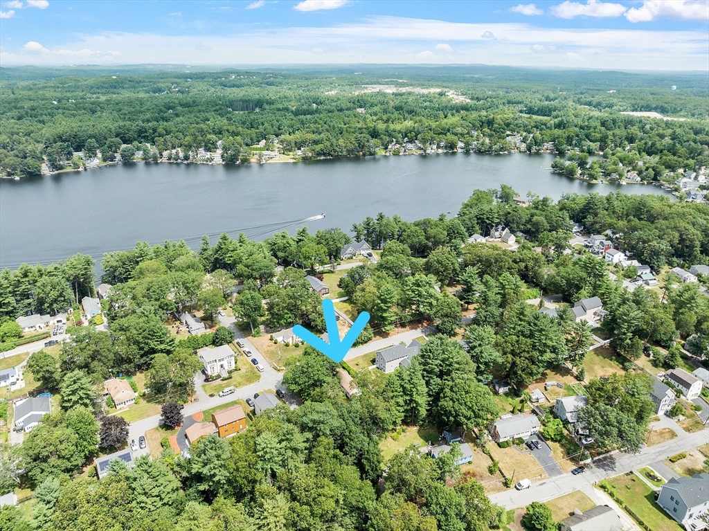 31 Birch Road Westford, MA 01886 - Photo 36 of 42 an aerial view of residential houses with outdoor space and lake view
