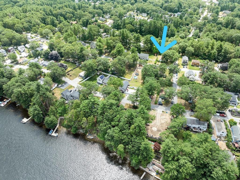 31 Birch Road Westford, MA 01886 - Photo 39 of 42 an aerial view of a house with a yard and covered with trees