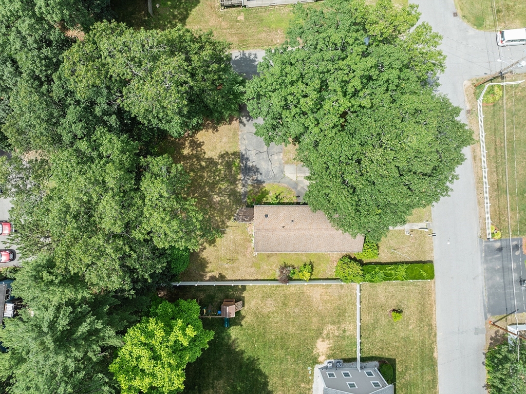 31 Birch Road Westford, MA 01886 - Photo 40 of 42 an aerial view of a house with a yard
