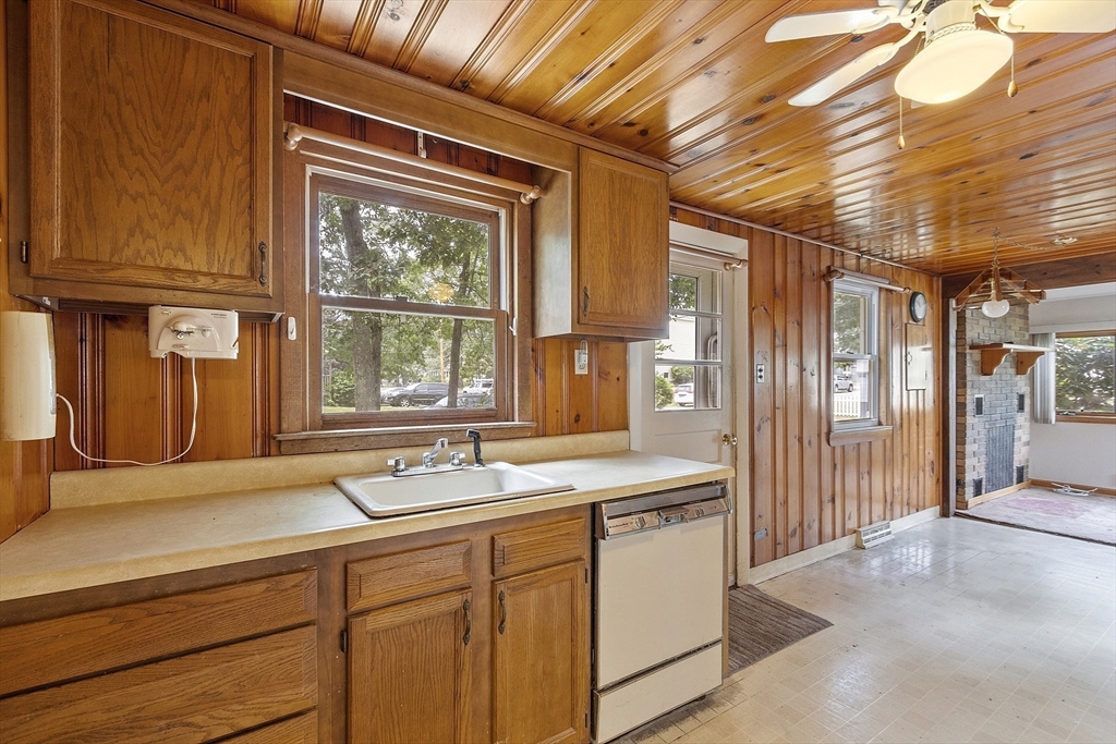 31 Birch Road Westford, MA 01886 - Photo 9 of 42 a bathroom with a sink and a large mirror