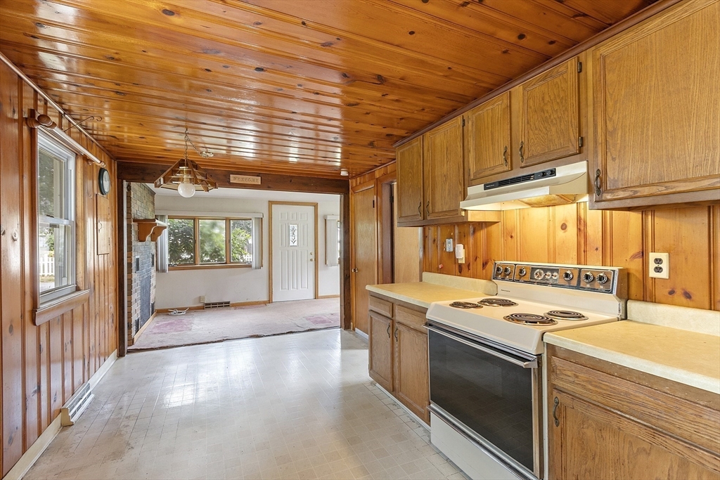 31 Birch Road Westford, MA 01886 - Photo 10 of 42 a kitchen that has a stove and a wooden floors
