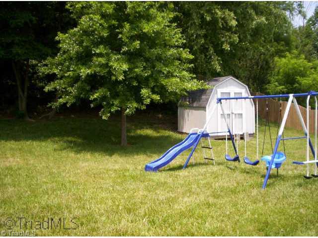 301 Stapleton Way High Point, NC 27265 - Photo 3 of 9 Other. beautiful yard.nice building and swingset stay.