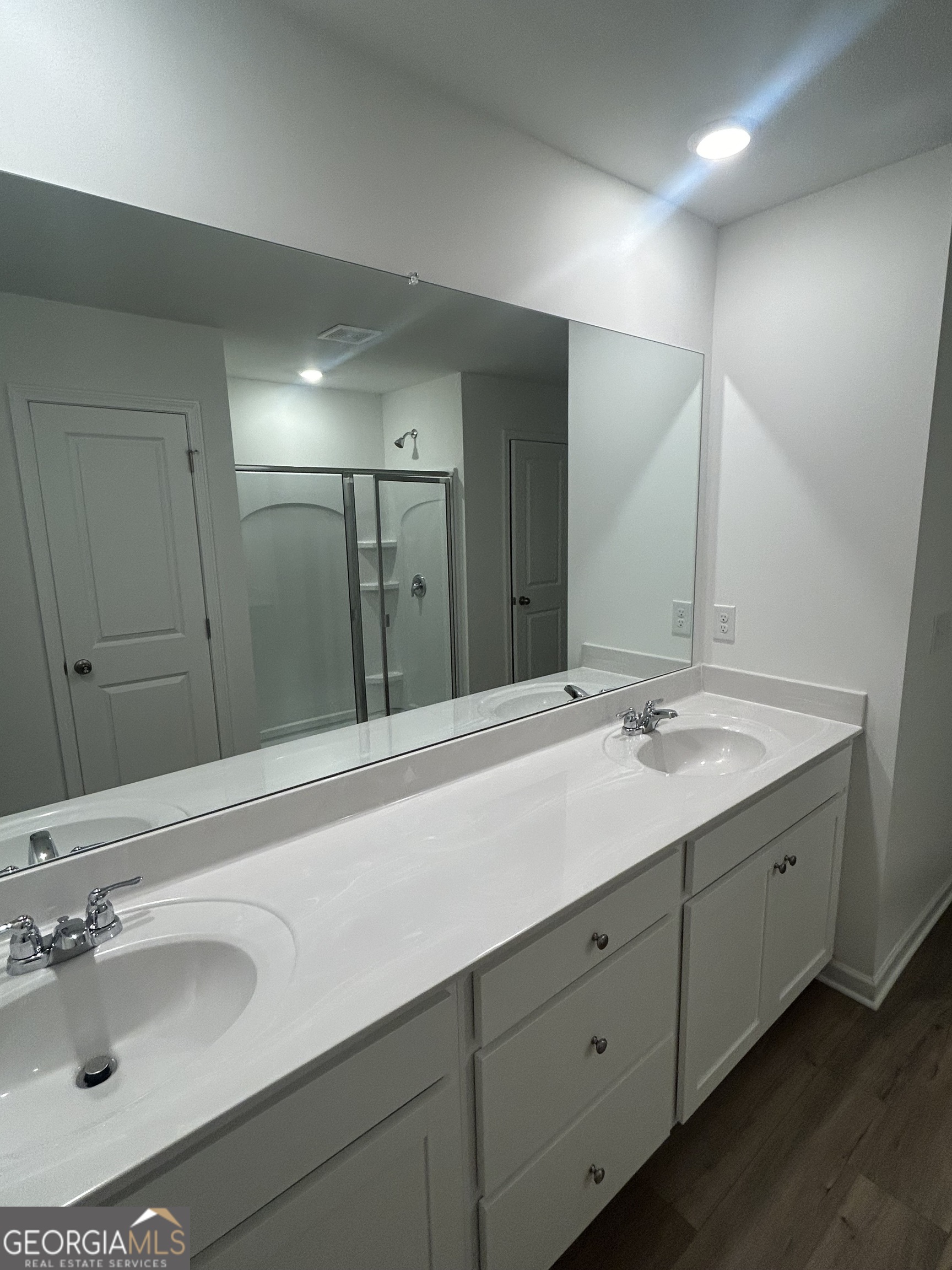 160 Vision Street Bethlehem, GA 30620 - Photo 10 of 11 a bathroom with a double vanity sink and a mirror