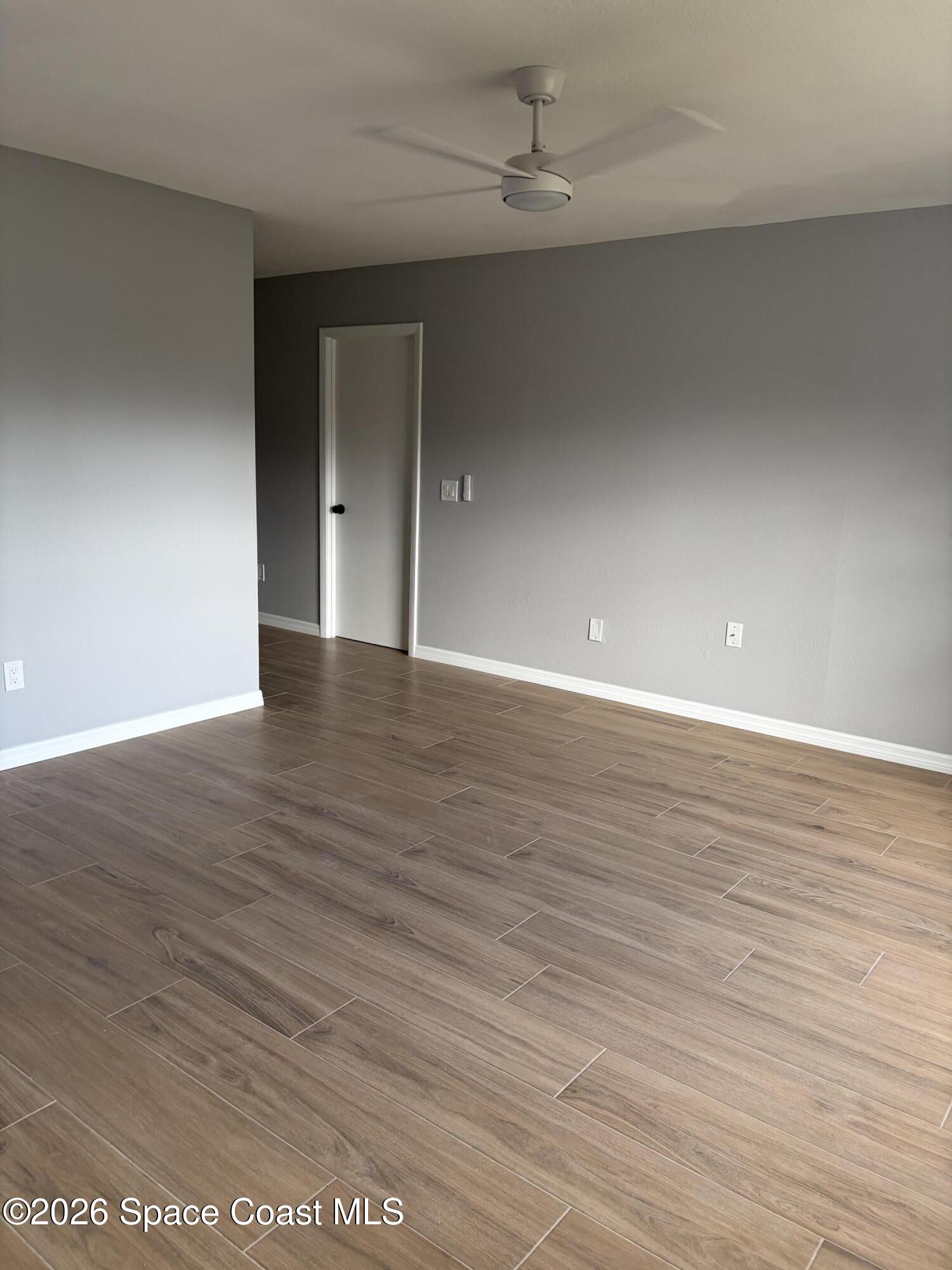 1136 Minnet Court Northeast Palm Bay, FL 32905 - Photo 26 of 31 Living room 1