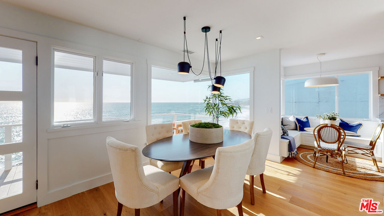 7 Camel Point Drive Laguna Beach, CA 92651 - Photo 11 of 52 a dining room with furniture and wooden floor