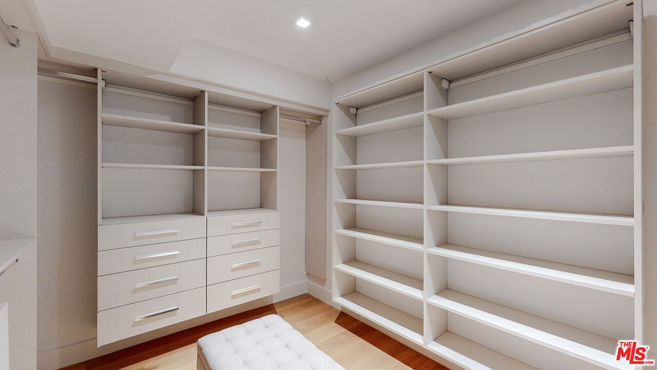 7 Camel Point Drive Laguna Beach, CA 92651 - Photo 23 of 52 a view of walk in closet with empty racks