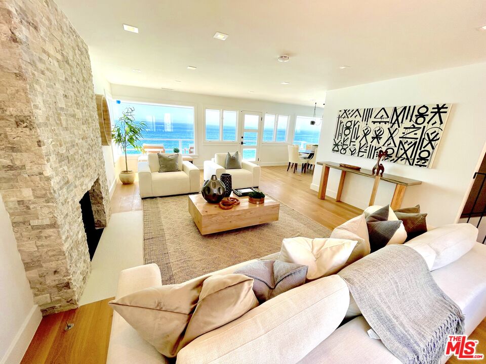 7 Camel Point Drive Laguna Beach, CA 92651 - Photo 4 of 52 a living room with furniture and a table