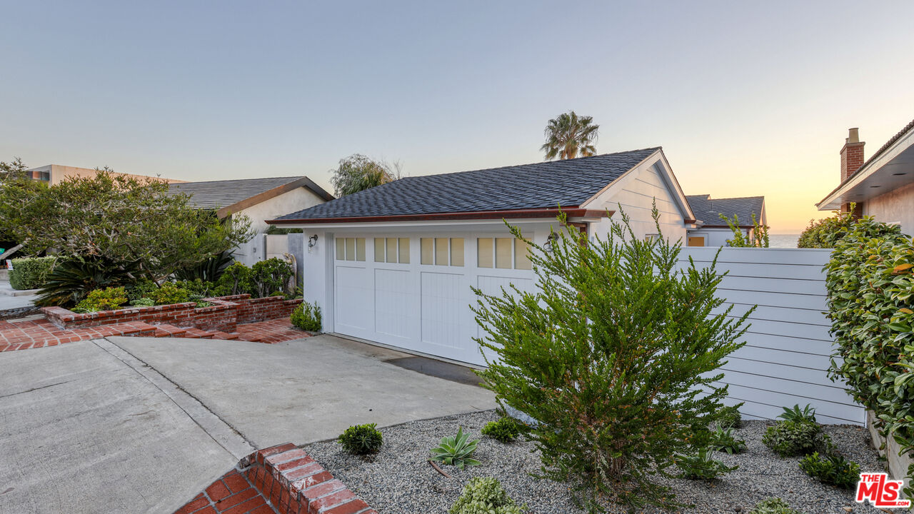 7 Camel Point Drive Laguna Beach, CA 92651 - Photo 49 of 52 a front view of a house with garden