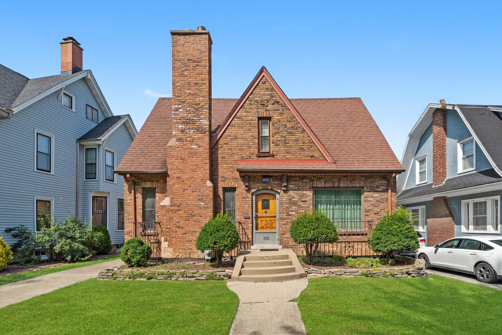 102 Lawton Road Riverside, IL 60546 - Photo 1 of 45 front view of a house with a yard