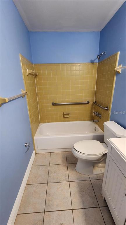 4801 Airport Road, Unit 118 Zephyrhills, FL 33542 - Photo 17 of 19 a bathroom with a toilet and a bathtub