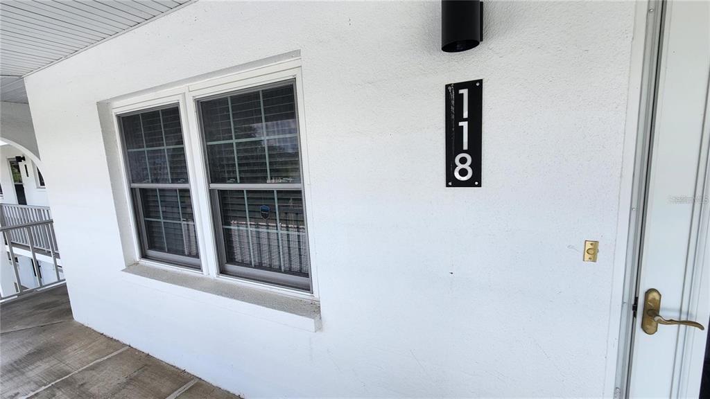 4801 Airport Road, Unit 118 Zephyrhills, FL 33542 - Photo 10 of 19 a view of front door of house