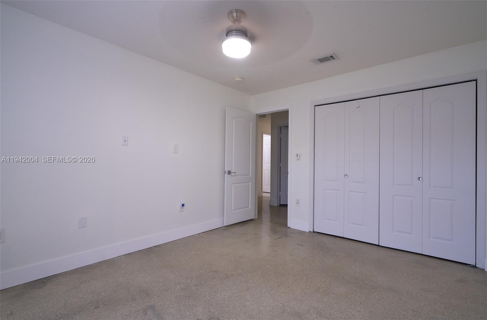 15213 Southwest 141st Street Miami, FL 33196 - Photo 14 of 18 a view of an empty room