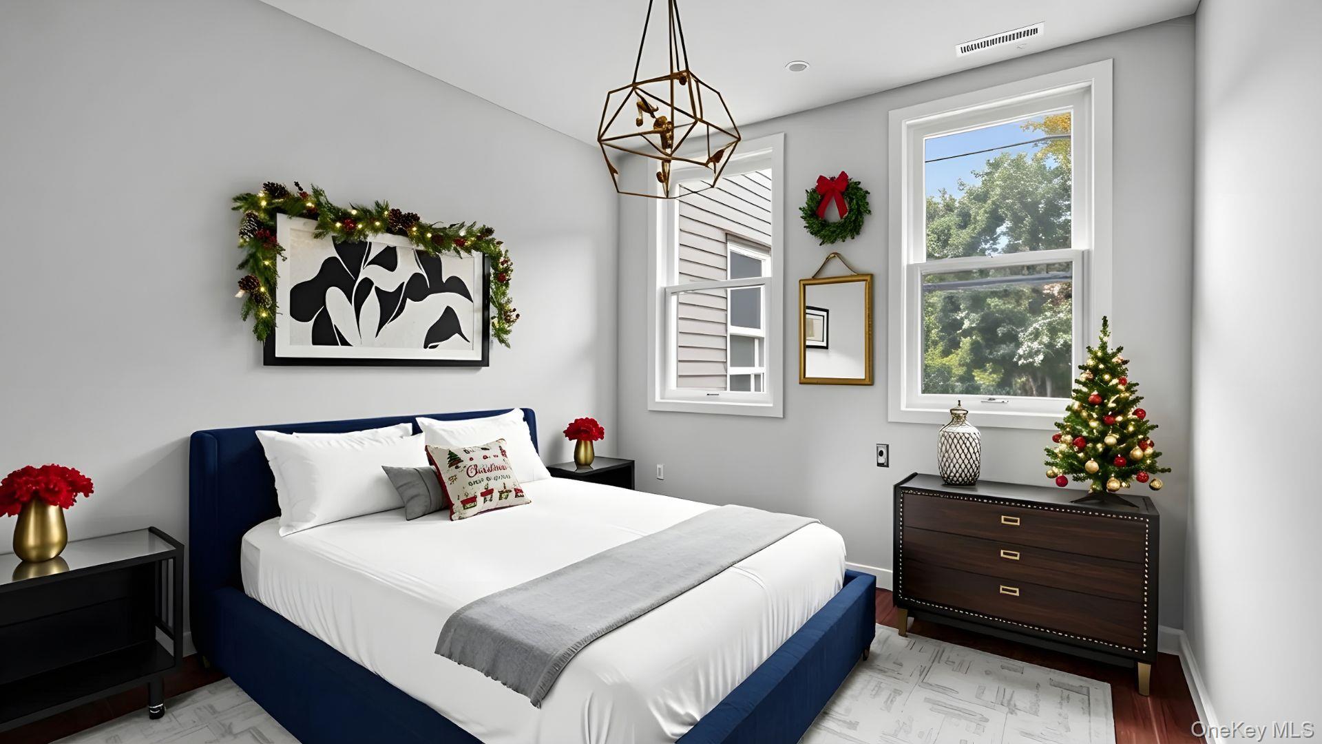 2040 Washington Avenue Bronx, NY 10457 - Photo 4 of 26 Bedroom with a chandelier