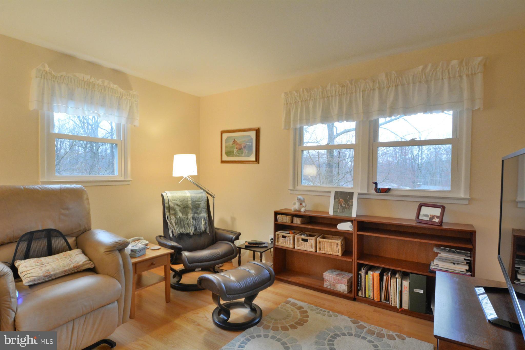 7909 Slidell Lane Springfield, VA 22151 - Photo 14 of 30 a living room with furniture and a window