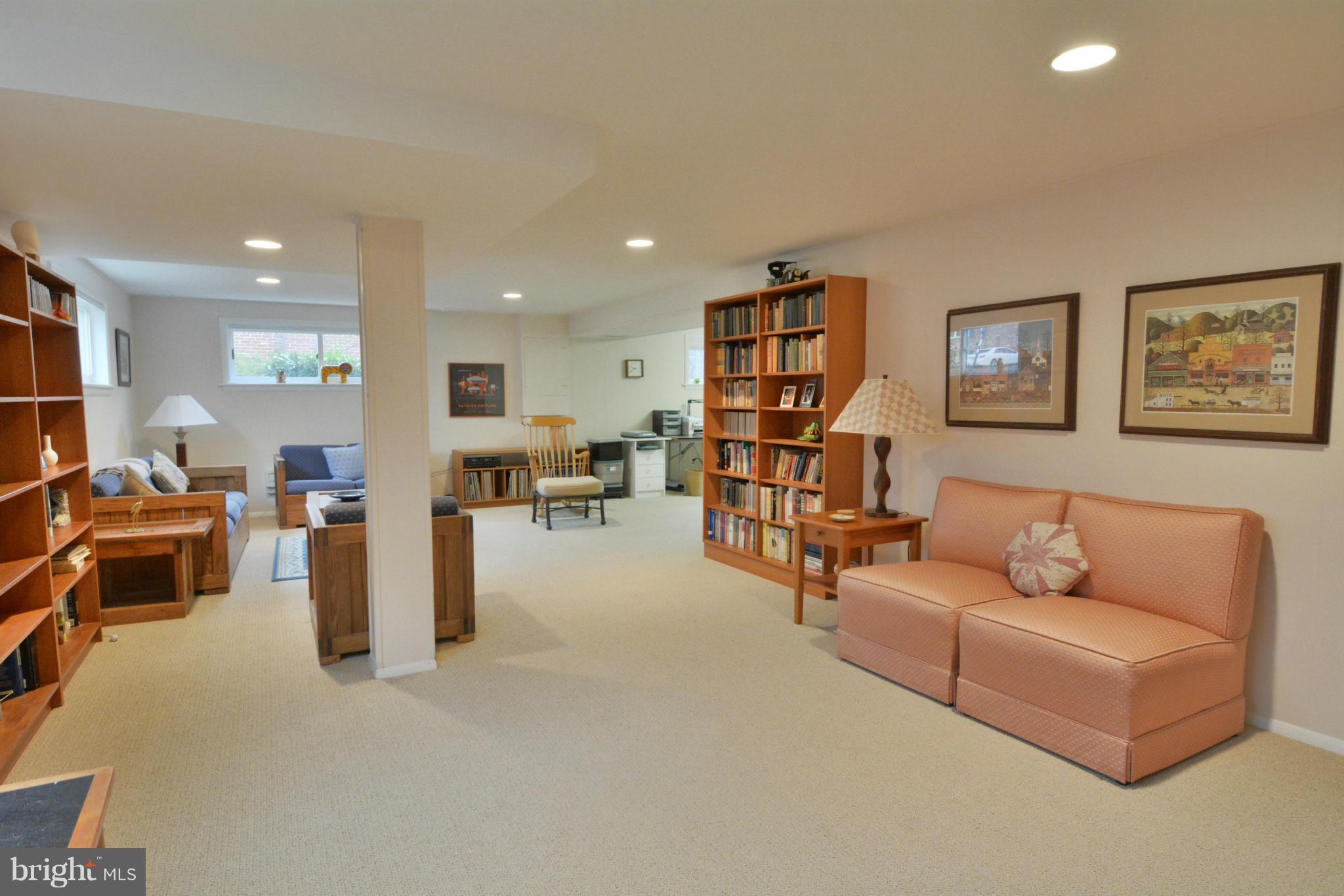 7909 Slidell Lane Springfield, VA 22151 - Photo 23 of 30 a living room with furniture and a table