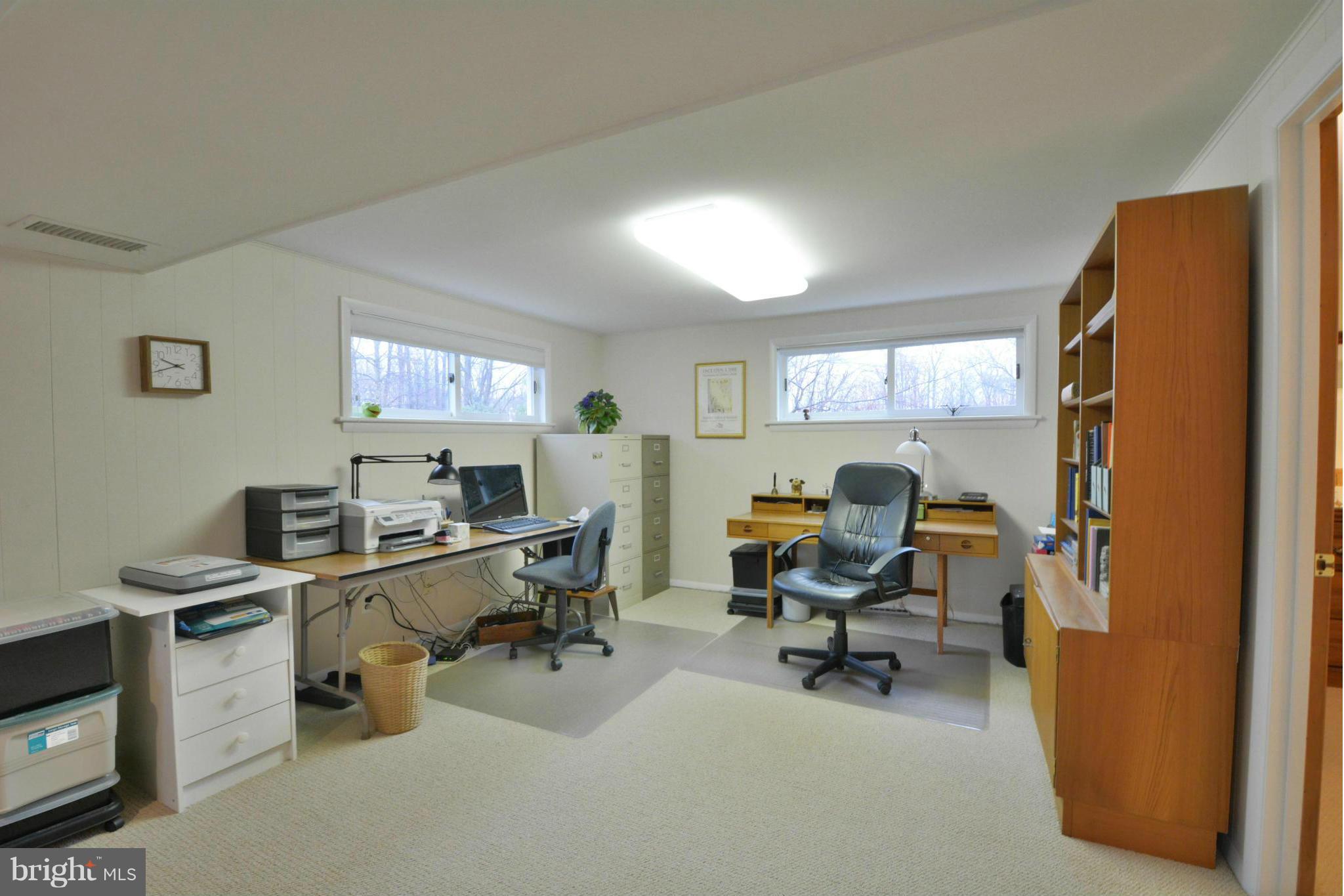 7909 Slidell Lane Springfield, VA 22151 - Photo 25 of 30 a view of a workspace with furniture and a window