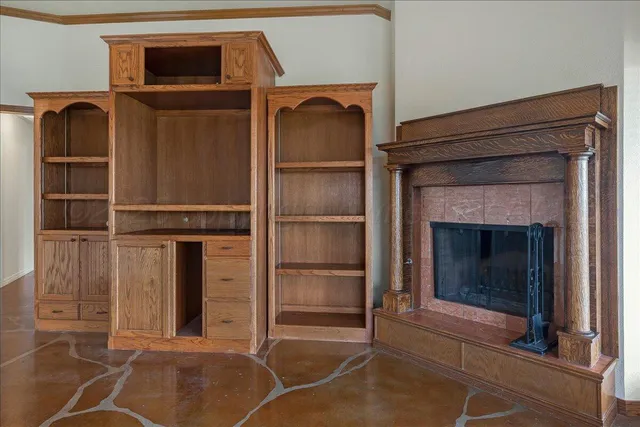 a view of a kitchen with a sink and cabinets