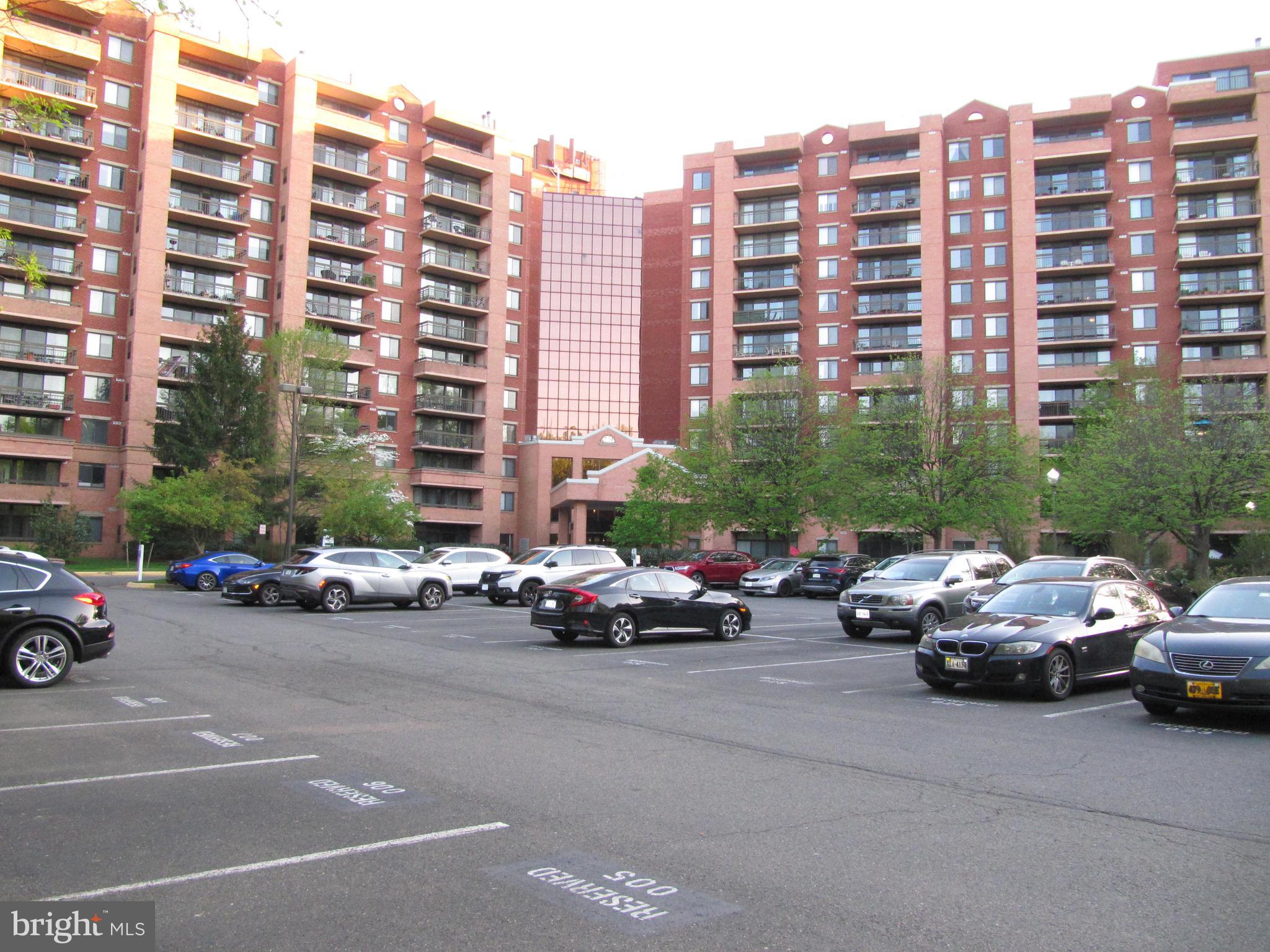 a view of a cars parked in front of a building