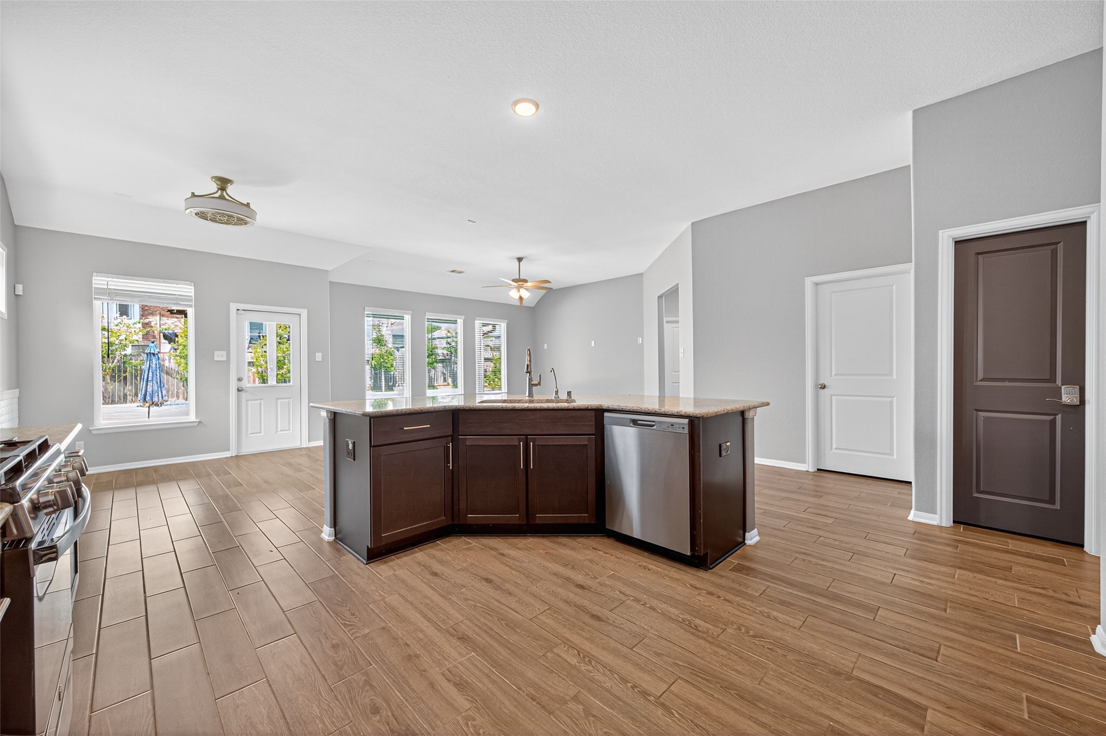 1312 Mainland Shores Lane Montgomery, TX 77316 - Photo 23 of 50 a kitchen with a sink and a refrigerator