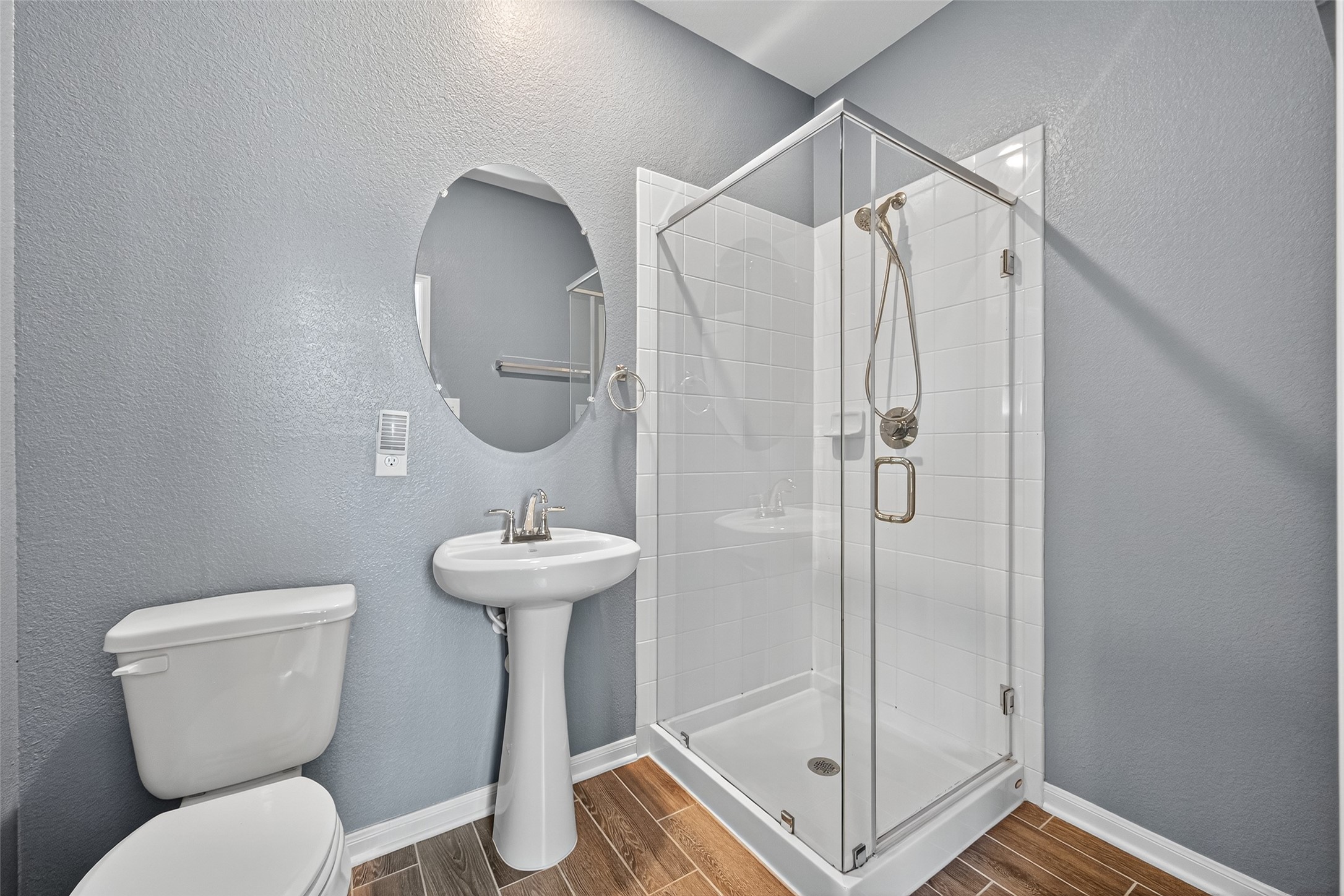 1312 Mainland Shores Lane Montgomery, TX 77316 - Photo 27 of 50 a bathroom with a sink toilet and shower