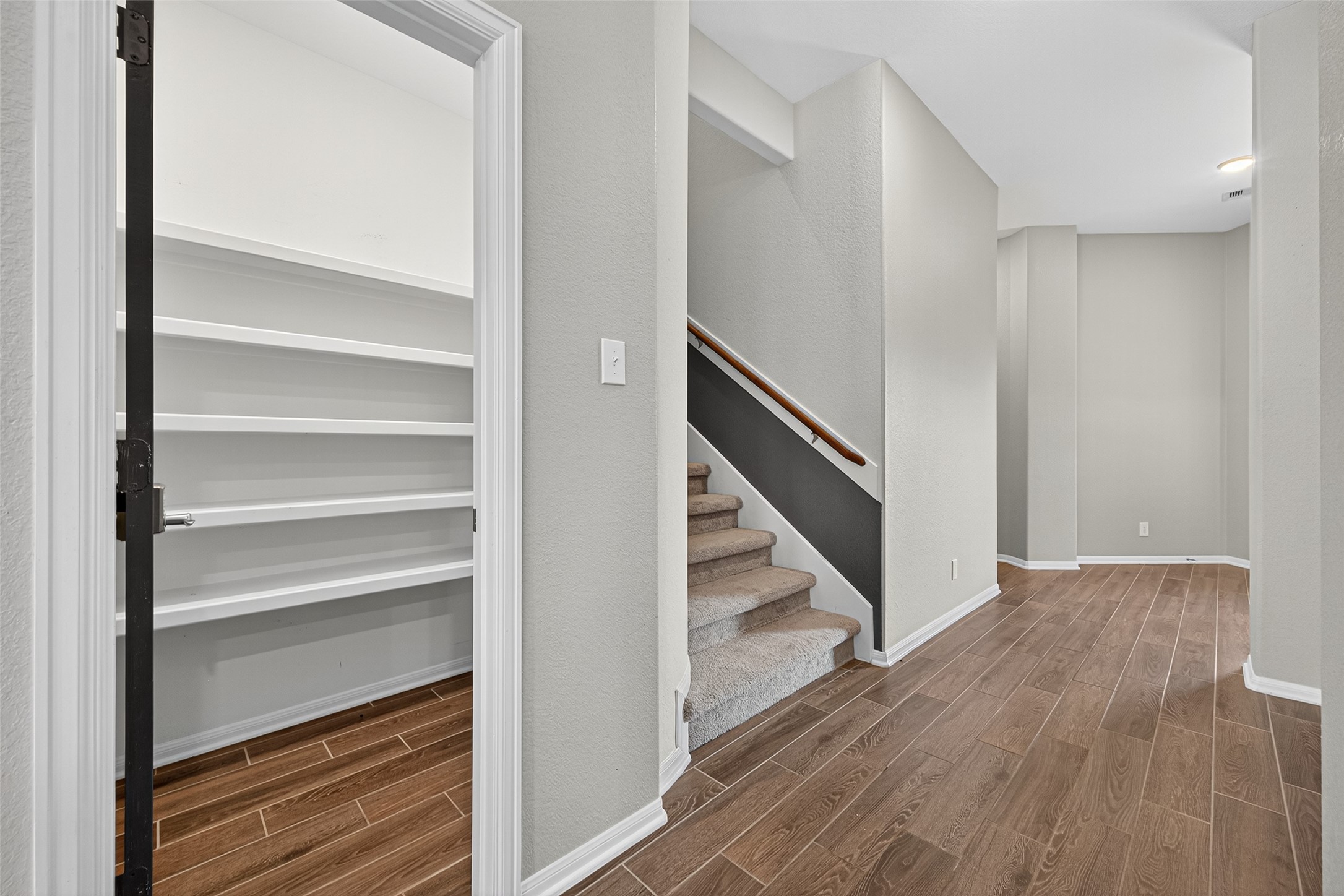 1312 Mainland Shores Lane Montgomery, TX 77316 - Photo 28 of 50 a view of an entryway with wooden floor