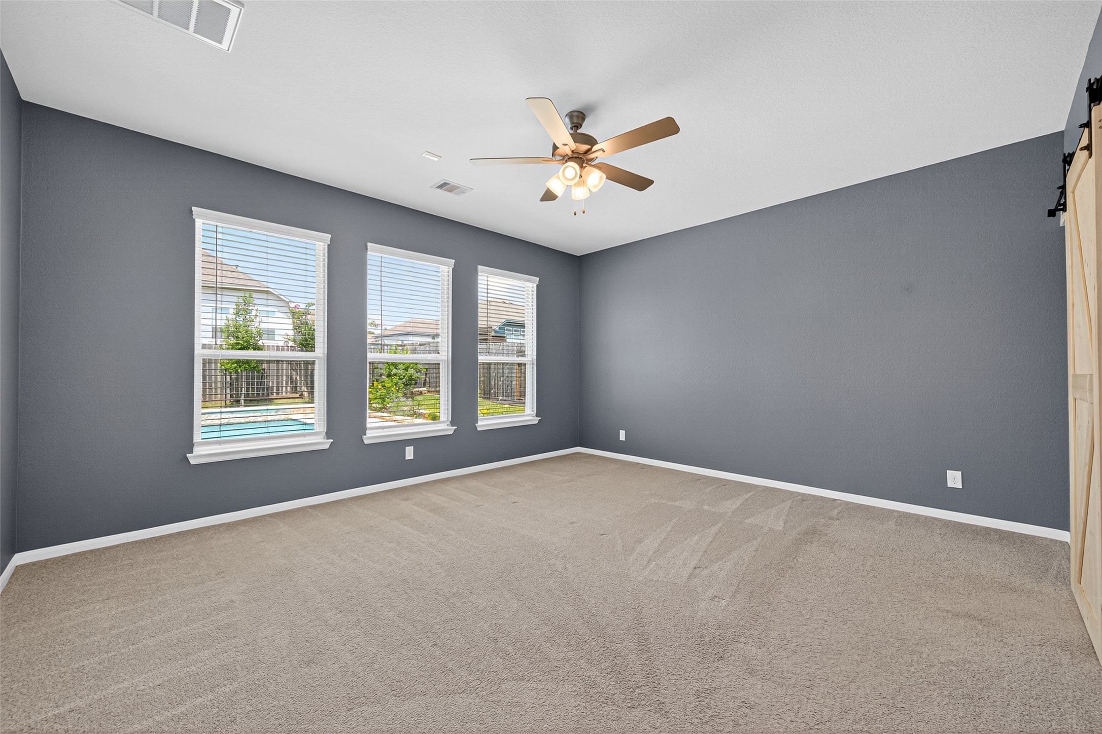 1312 Mainland Shores Lane Montgomery, TX 77316 - Photo 40 of 50 a view of an empty room with a window