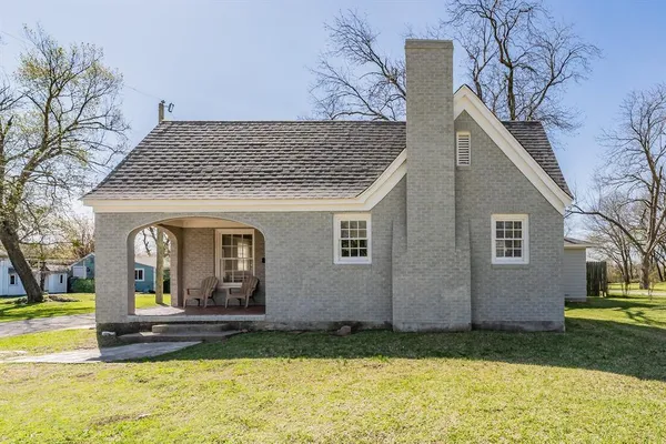 a view of a house with garden