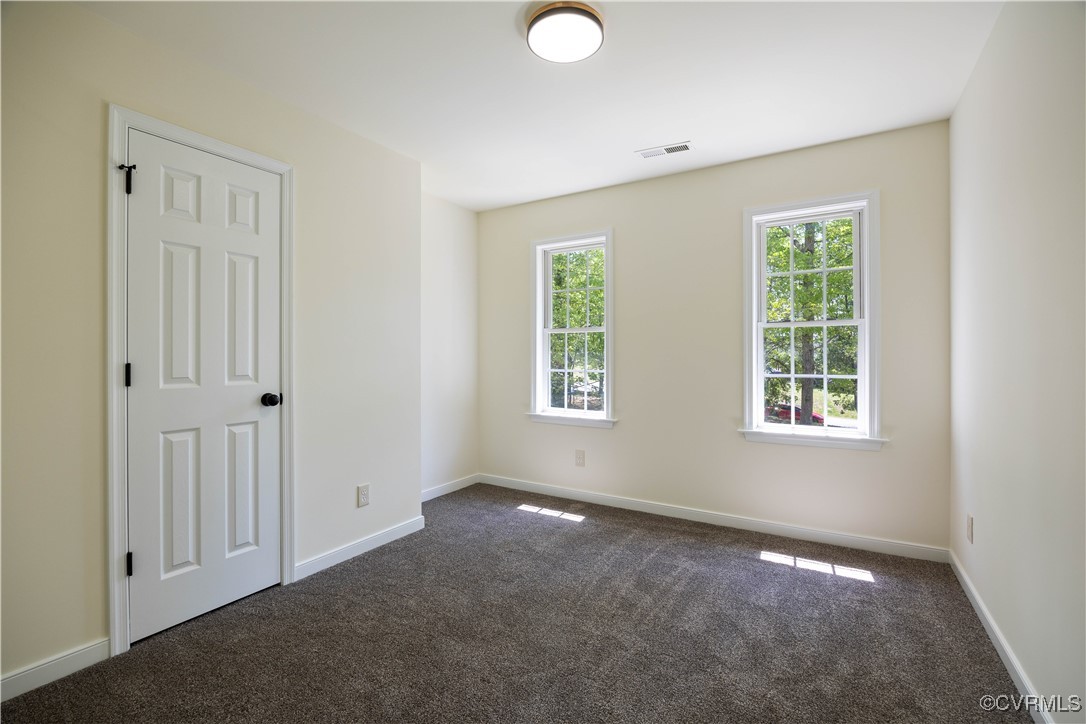 11730 Corte Castle Road Chesterfield, VA 23838 - Photo 20 of 50 Empty room with baseboards, dark colored carpet, a