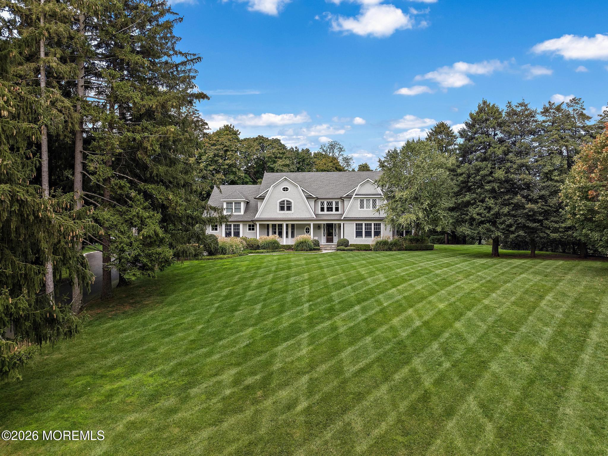 94 Ridge Road Rumson, NJ 07760 - Photo 3 of 40 a view of a house with a big yard