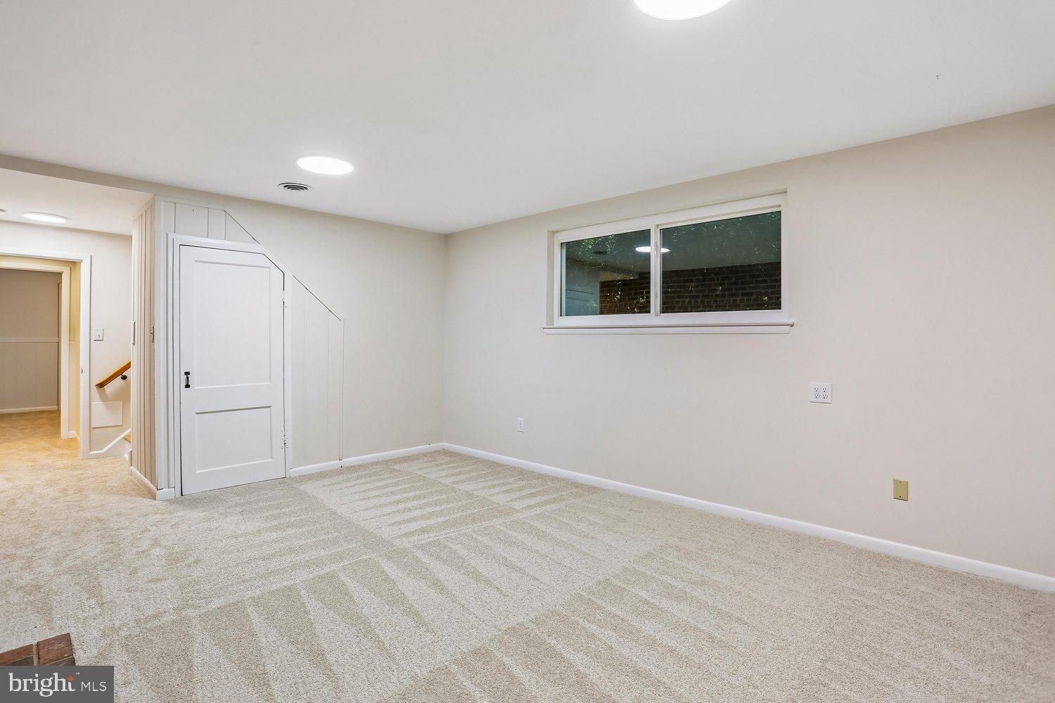 907 Hoyt Street Silver Spring, MD 20902 - Photo 44 of 69 a view of an empty room with a window