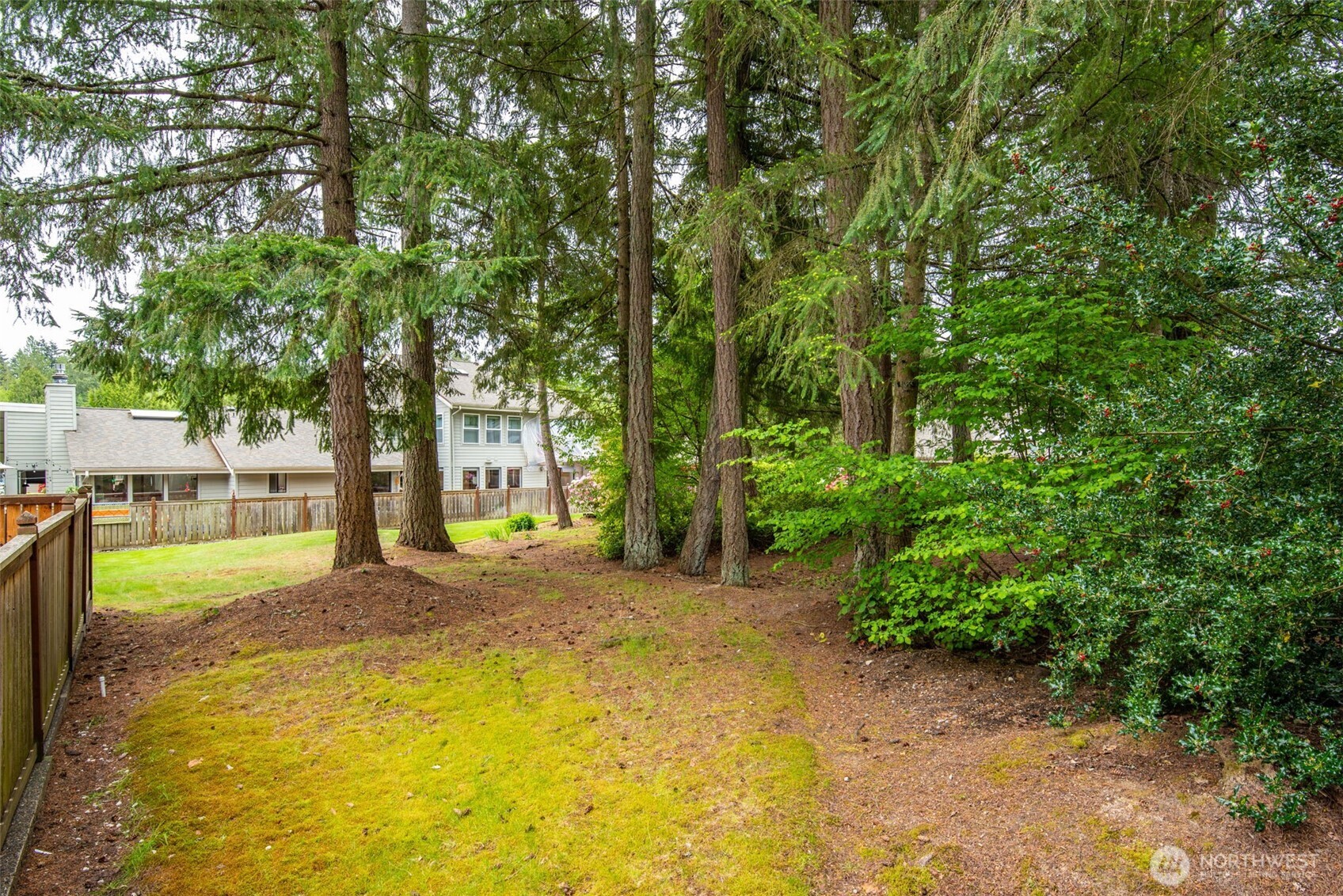1322 Boise Street Fircrest, WA 98466 - Photo 5 of 40 a view of swimming pool with trees in the background