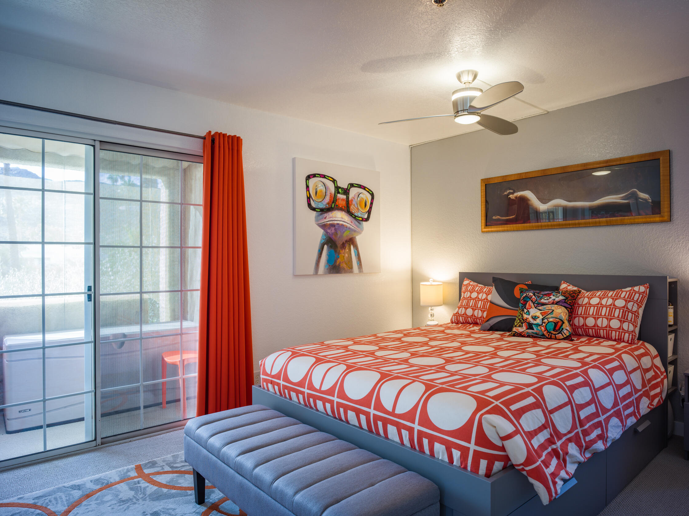 2700 Lawrence Crossley Road, Unit 7 Palm Springs, CA 92264 - Photo 13 of 28 a bedroom with a bed and a chandelier