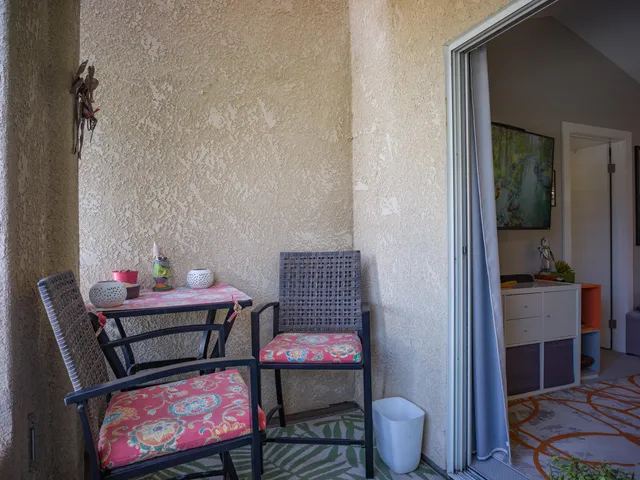 a view of yard with swimming pool and green space