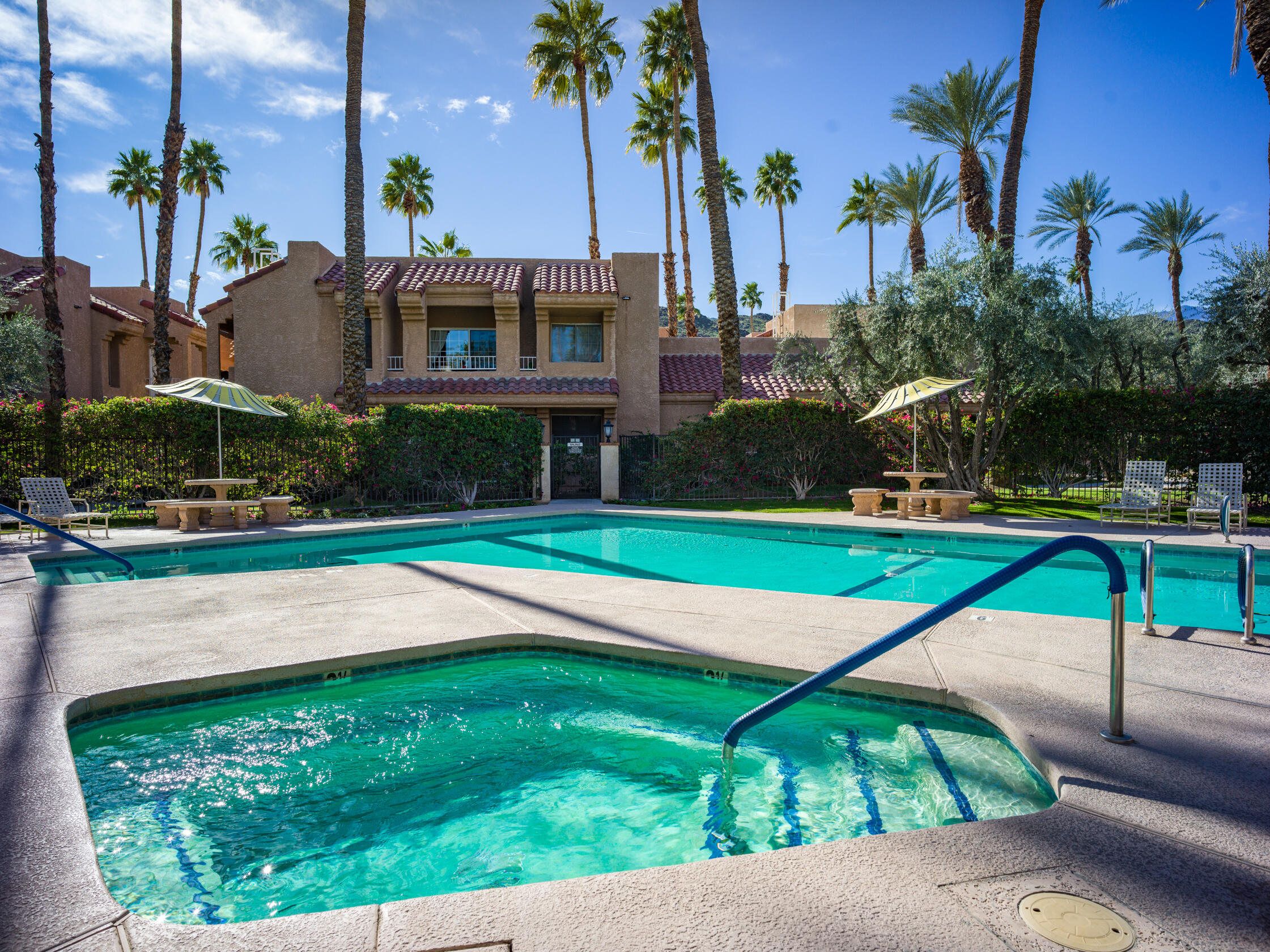 2700 Lawrence Crossley Road, Unit 7 Palm Springs, CA 92264 - Photo 23 of 28 a view of yard with swimming pool and green space