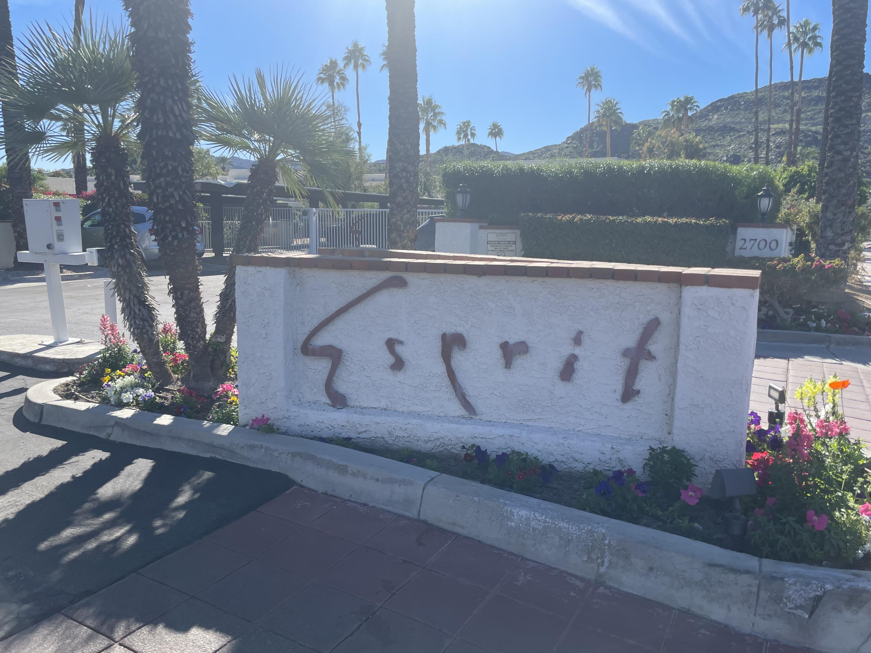 2700 Lawrence Crossley Road, Unit 7 Palm Springs, CA 92264 - Photo 5 of 28 a sign that is on the side of the road