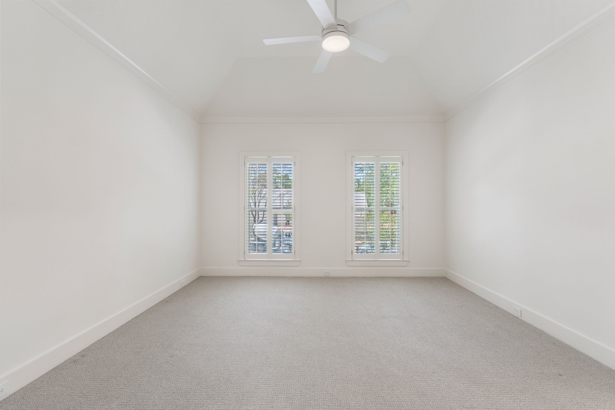 31 Hollymead Drive Spring, TX 77381 - Photo 39 of 50 Another spacious bedroom upstairs with large walk-in closet, ceiling fan and access to full bathroom.