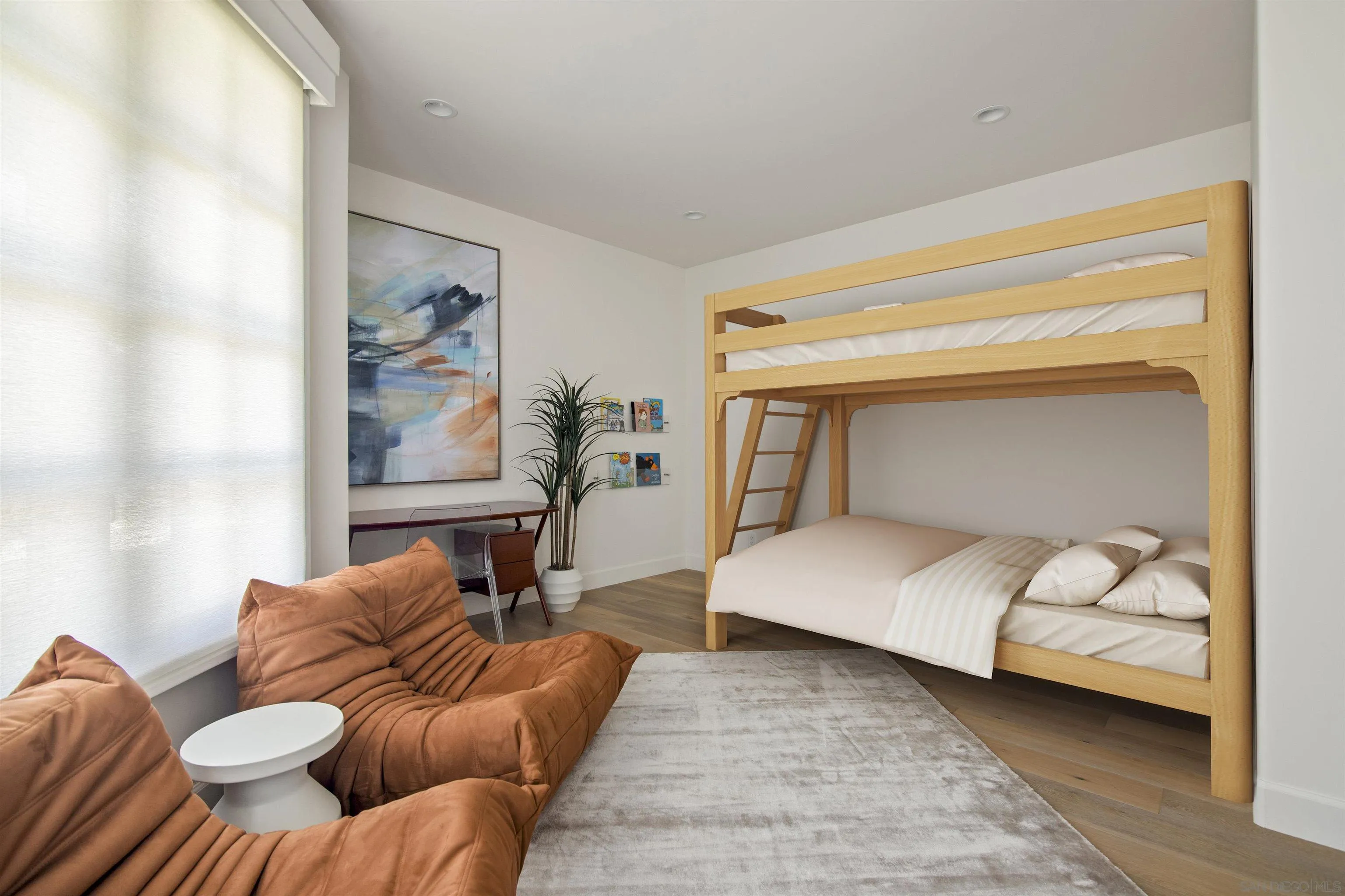 7729 Ivanhoe Avenue La Jolla, CA 92037 - Photo 26 of 28 a living room with furniture and a couch