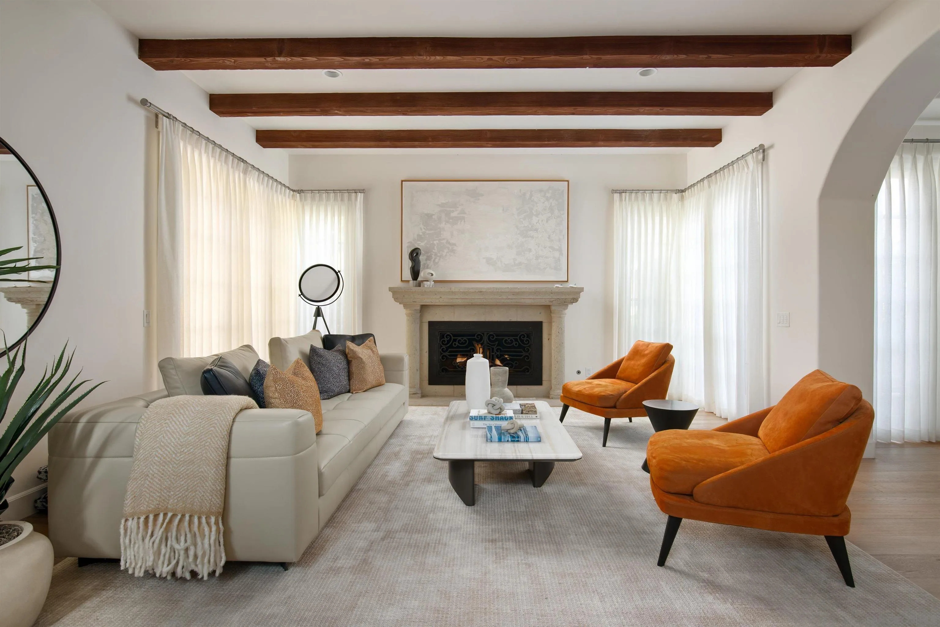 7729 Ivanhoe Avenue La Jolla, CA 92037 - Photo 4 of 28 a living room with furniture and a fireplace