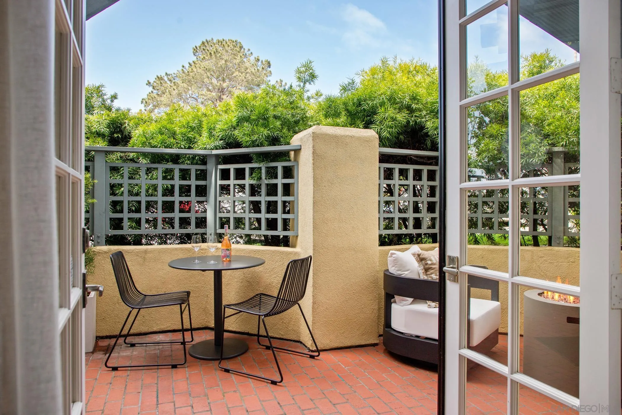 7729 Ivanhoe Avenue La Jolla, CA 92037 - Photo 10 of 28 a view of a chairs and table in the patio
