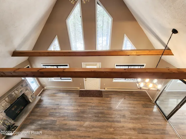 a view of entryway with wooden floor