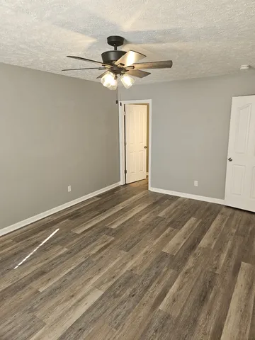 a bathroom with a double vanity sink and mirror