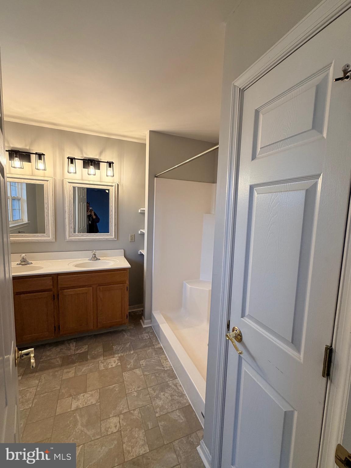 156 Sparrow Road Hummelstown, PA 17036 - Photo 11 of 29 a large bathroom with a tub sink and mirror