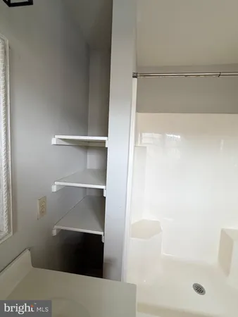 a bathroom with a bathtub