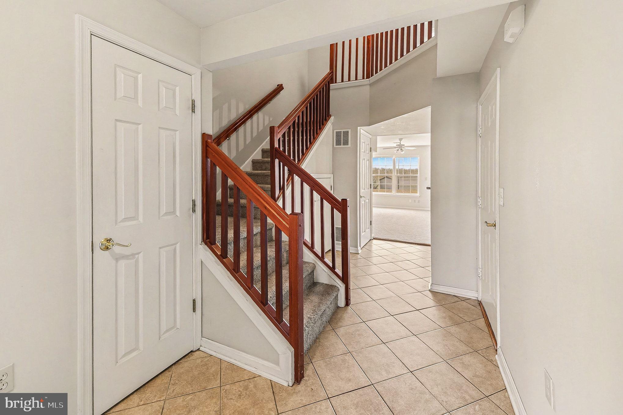 156 Sparrow Road Hummelstown, PA 17036 - Photo 15 of 29 a view of a hallway with wooden floor and entryway