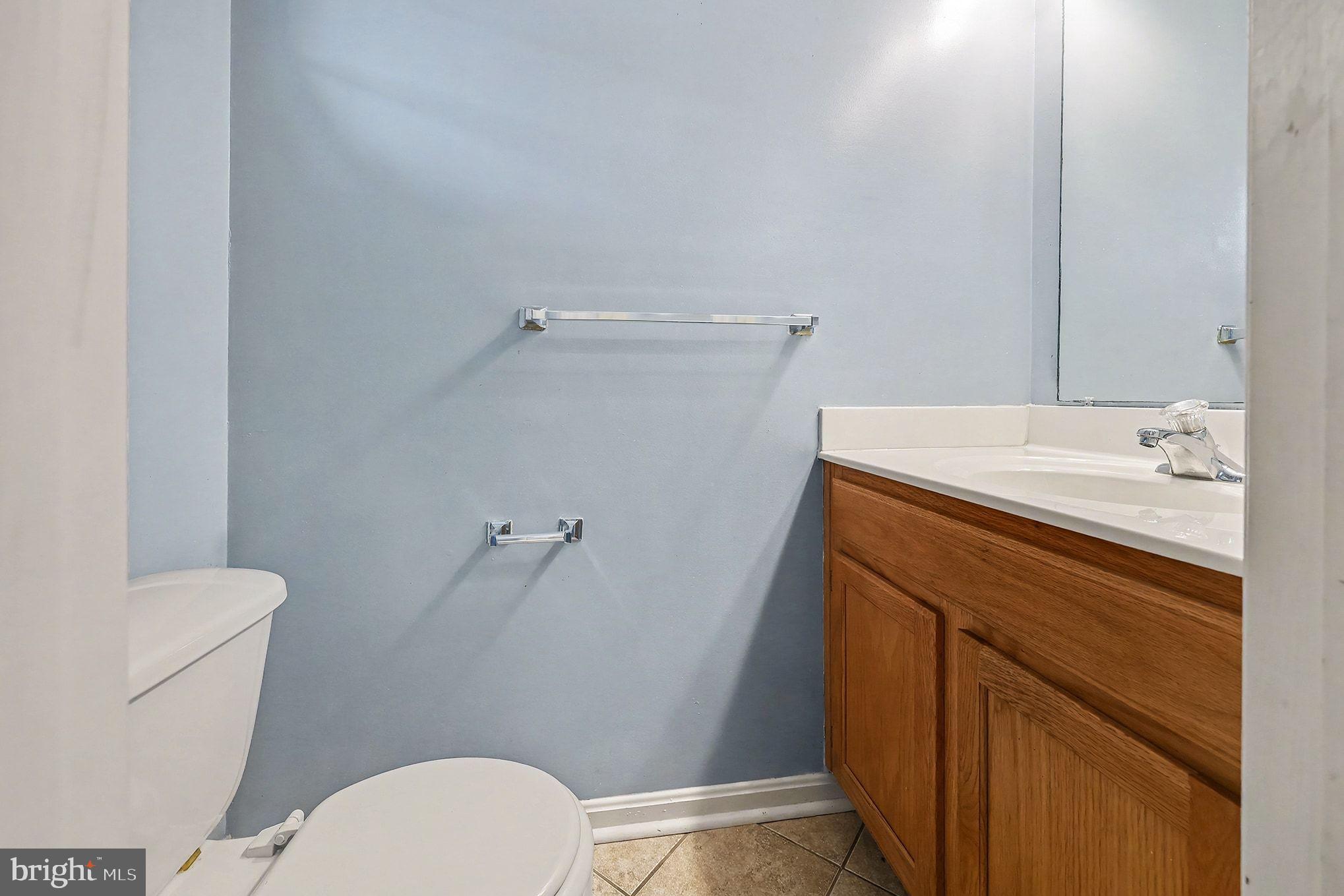 156 Sparrow Road Hummelstown, PA 17036 - Photo 20 of 29 a bathroom with a sink a toilet and a mirror