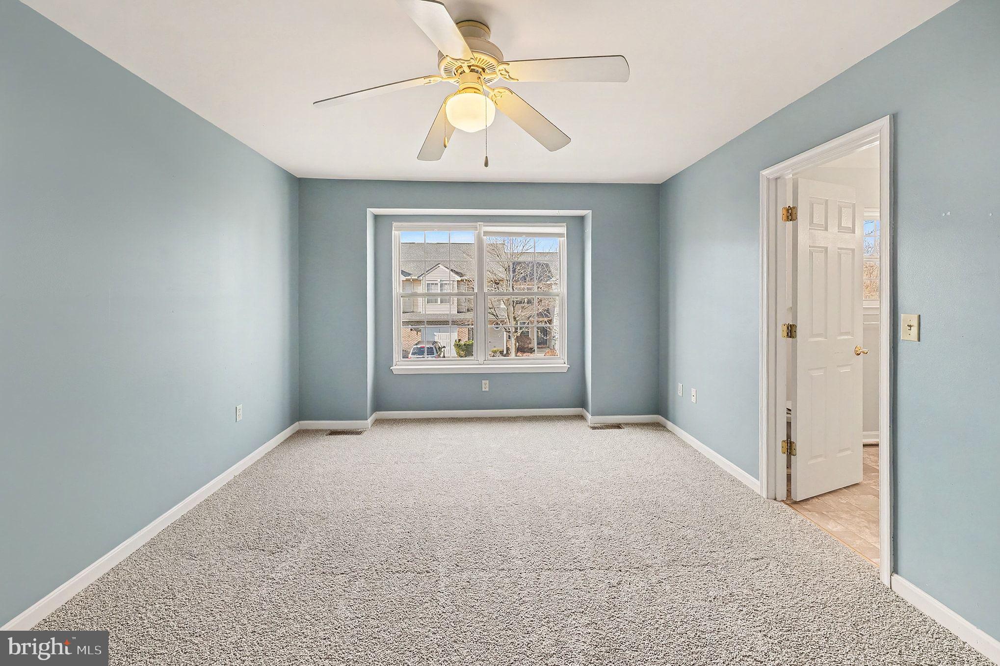 156 Sparrow Road Hummelstown, PA 17036 - Photo 25 of 29 an empty room with windows and fan