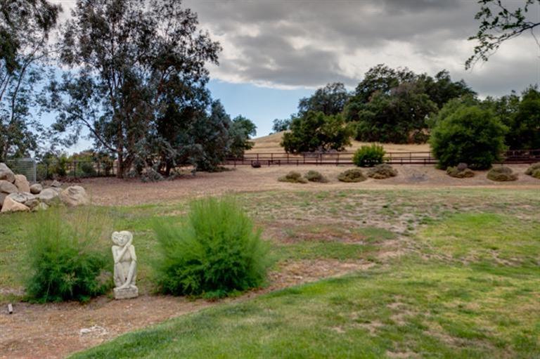 12751 Blue Heron Circle Ojai, CA 93023 - Photo 18 of 22 a view of a dry yard with wooden fence